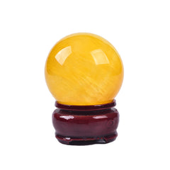 Close-up of JIC Gem yellow fluorite sphere showing natural color patterns