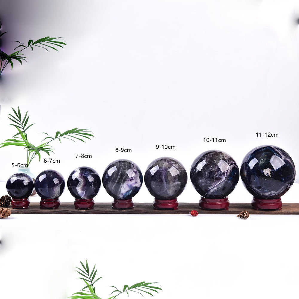 Fluorite ball with stand adds harmony to witchcraft and Reiki practices.