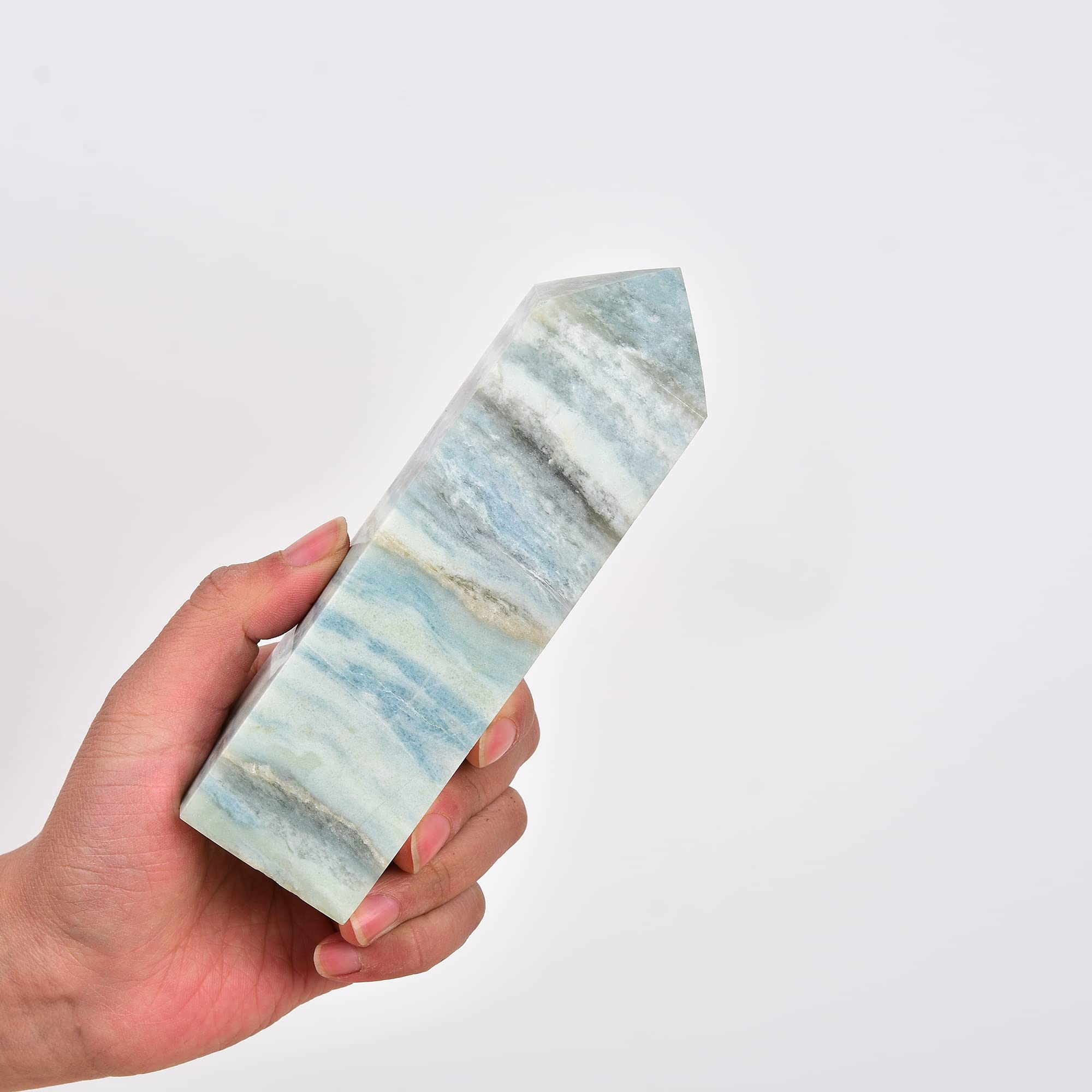 JIC Gem Obelisk tower in a serene room setting as decor