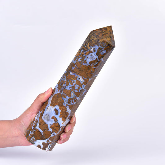 JIC Gem Yellow Agate Obelisk Tower shown in sunlight for meditation and energy focus.
