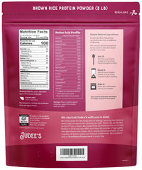 Judee's Brown Rice Protein Powder scoop in glass shake for easy smoothies.
