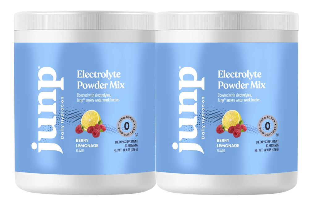 JUNP Electrolytes powder in fresh-berry-lemonade flavor stirred into water for hydration.