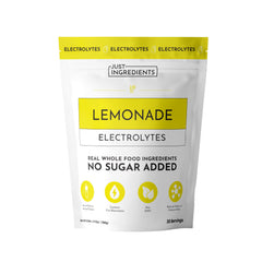 JUST INGREDIENTS Lemonade Electrolytes powder dissolving in water for quick hydration.