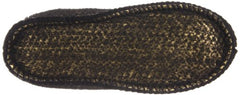 Kamik snow boot black sole close-up, durable tread for icy surfaces.