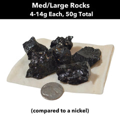 Karelia Creations Elite Noble Shungite Rocks for use with plants and soil as decorative accents.