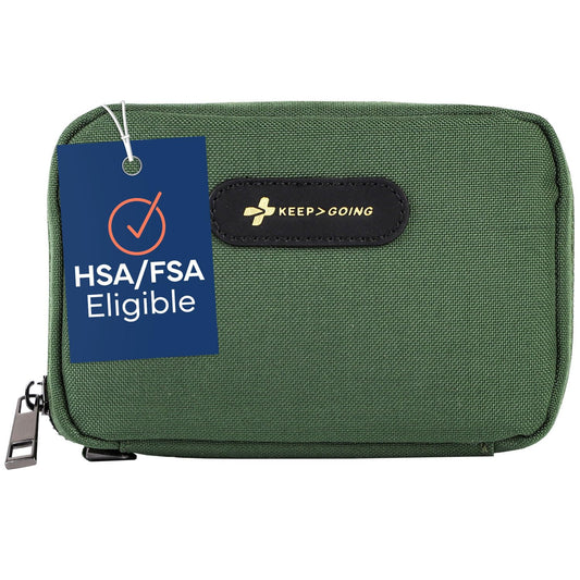 KEEP>GOING travel first aid kit for kids shown in a purse for quick on-the-go protection.