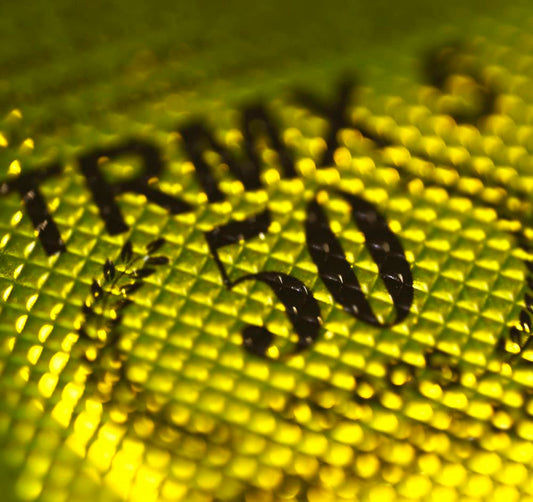 Close-up of Kenrico patches packaging highlighting anniversary edition and premium materials for reliable wear