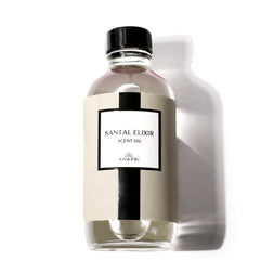 KHAPRI Santal Elixir bottle closeup highlighting premium diffuser oil for lasting scent.