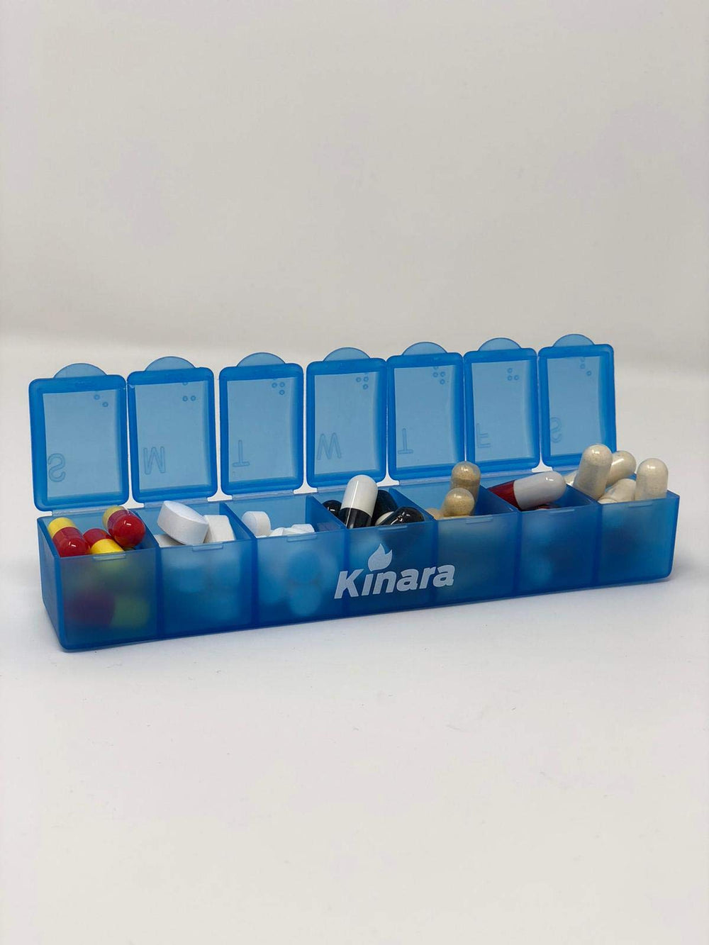 Close-up of Kinara Slo Niacin capsules highlighting flush-free release
