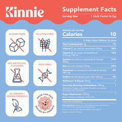 Kinnie single-serve stick beside water bottle, travel-friendly daily vitamins