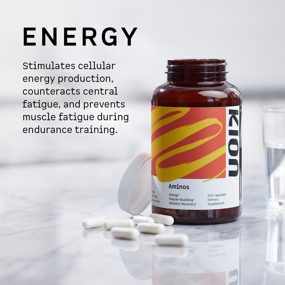 Kion Aminos Essentials capsules poured for easy daily intake