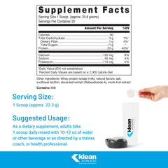 Klean Isolate vanilla powder being scooped for post-workout shake