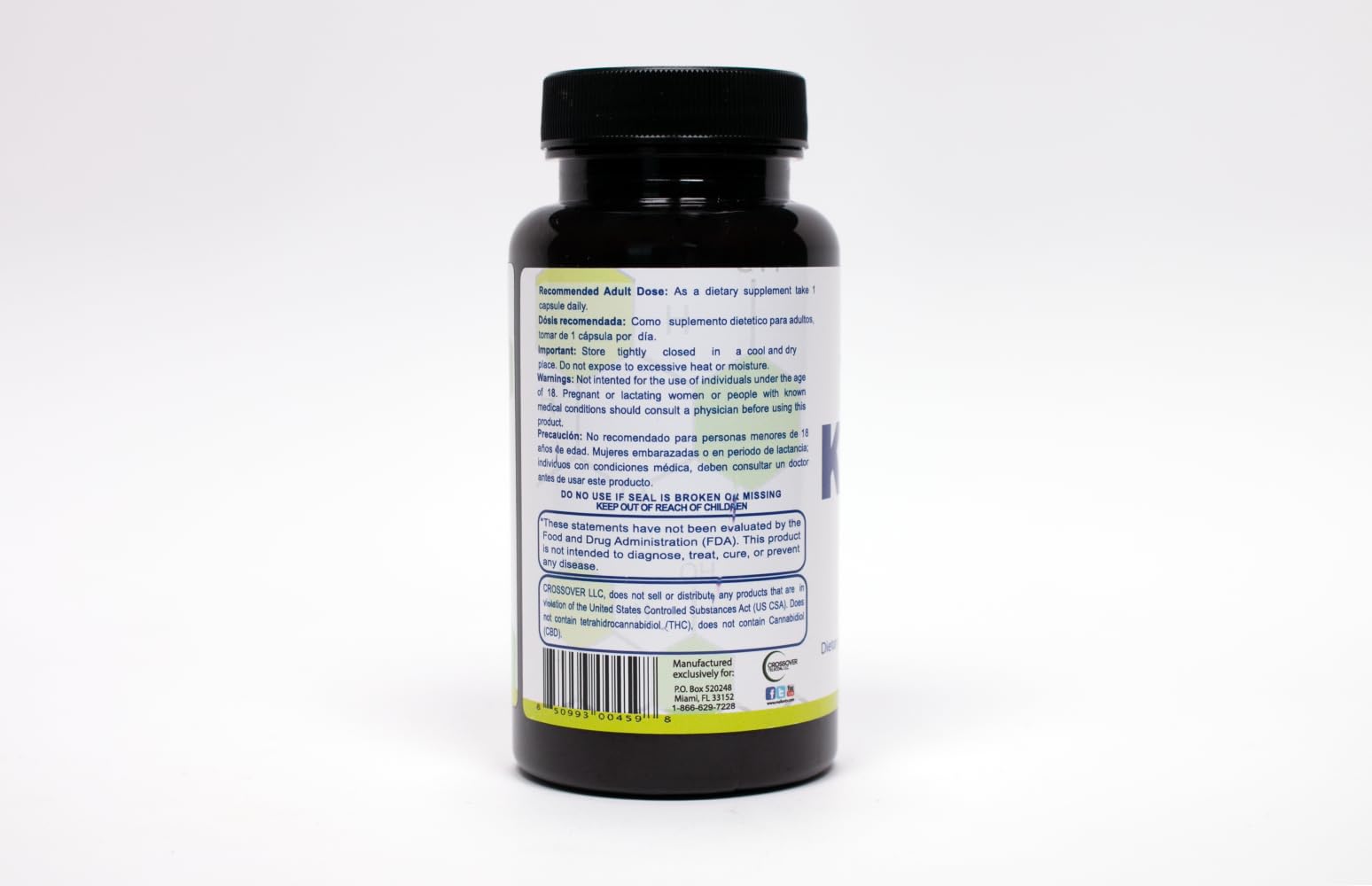 Close-up of Knadix Hemp Oil label highlighting cold-pressed organic ingredients.