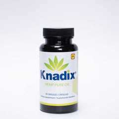 Pouring Knadix Hemp Oil from the bottle for a simple daily routine.