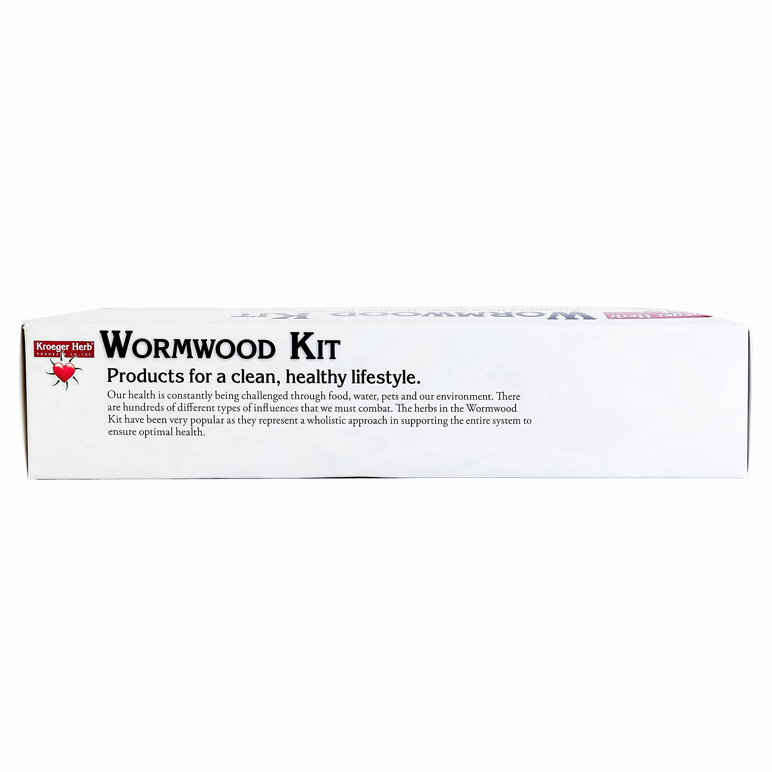 Kroeger Wormwood Detox kit flat lay with capsules and botanicals.