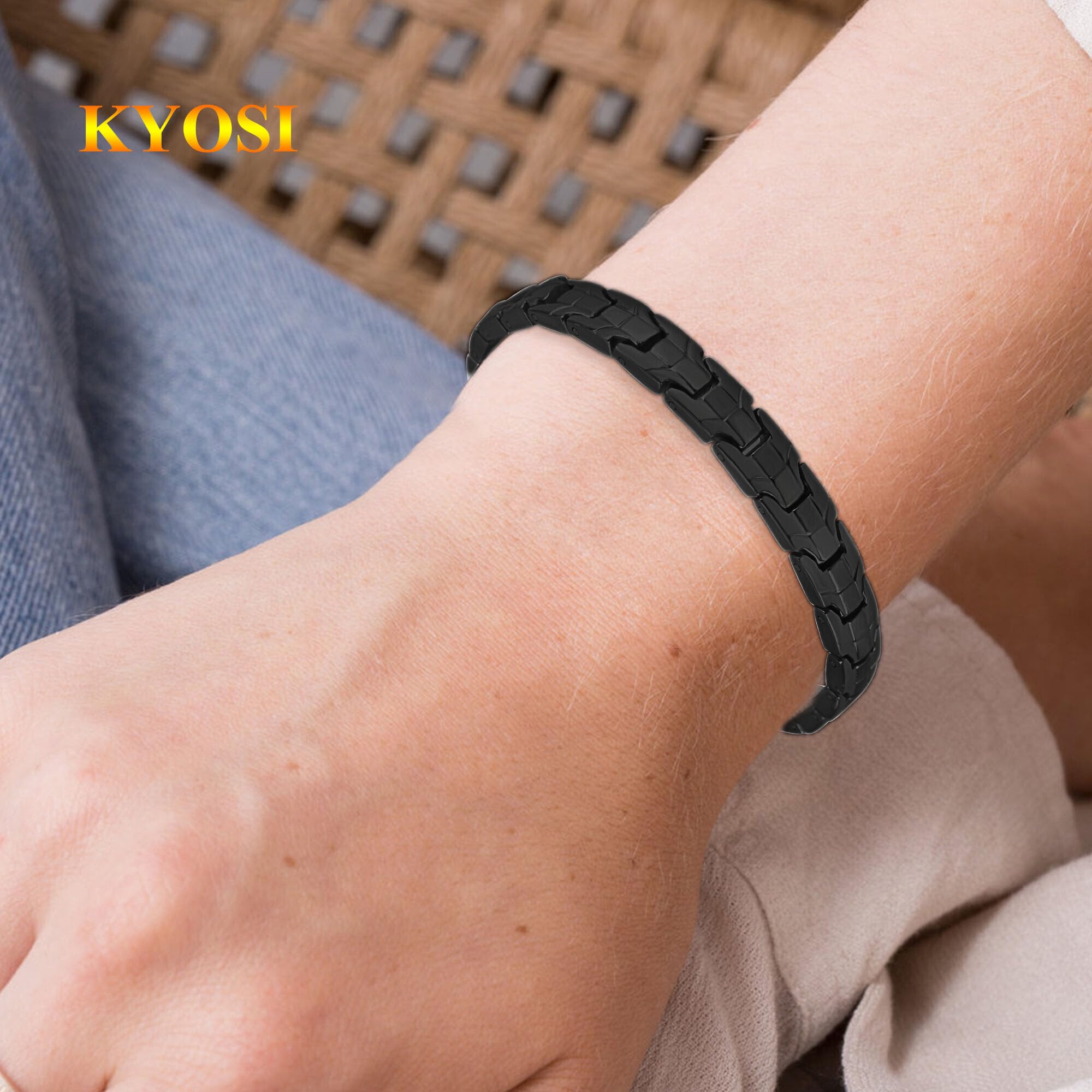 Model wearing KYOSI bracelet with a sleek evening look
