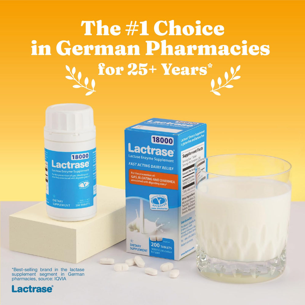 Lactrase extra-strength tablets close-up; high-potency lactase for quicker dairy digestion.