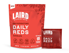 Laird Superfood Antioxidant Daily Reds bottle ready for a post-workout fruity boost