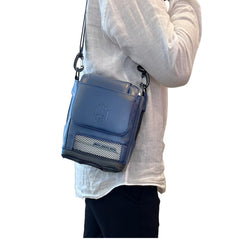 Lamed storage pocket for phone, keys, and wallet.