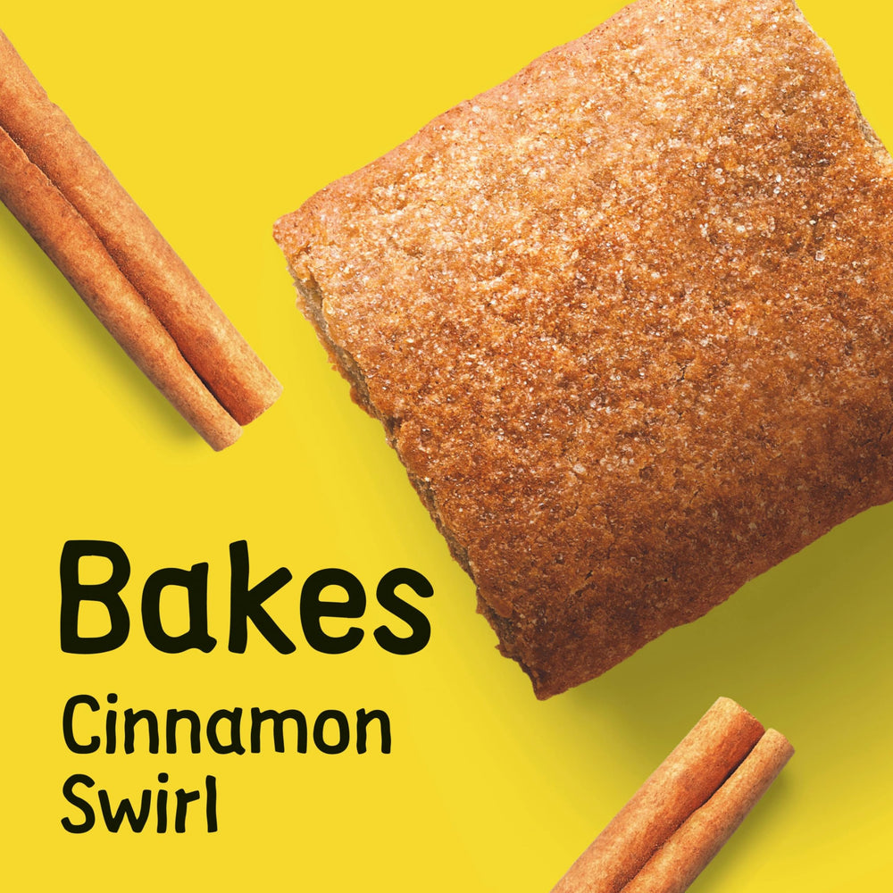 Larabar Kids Bakes Cinnamon Swirl bar texture close-up shows chewy bite for on-the-go snacking.