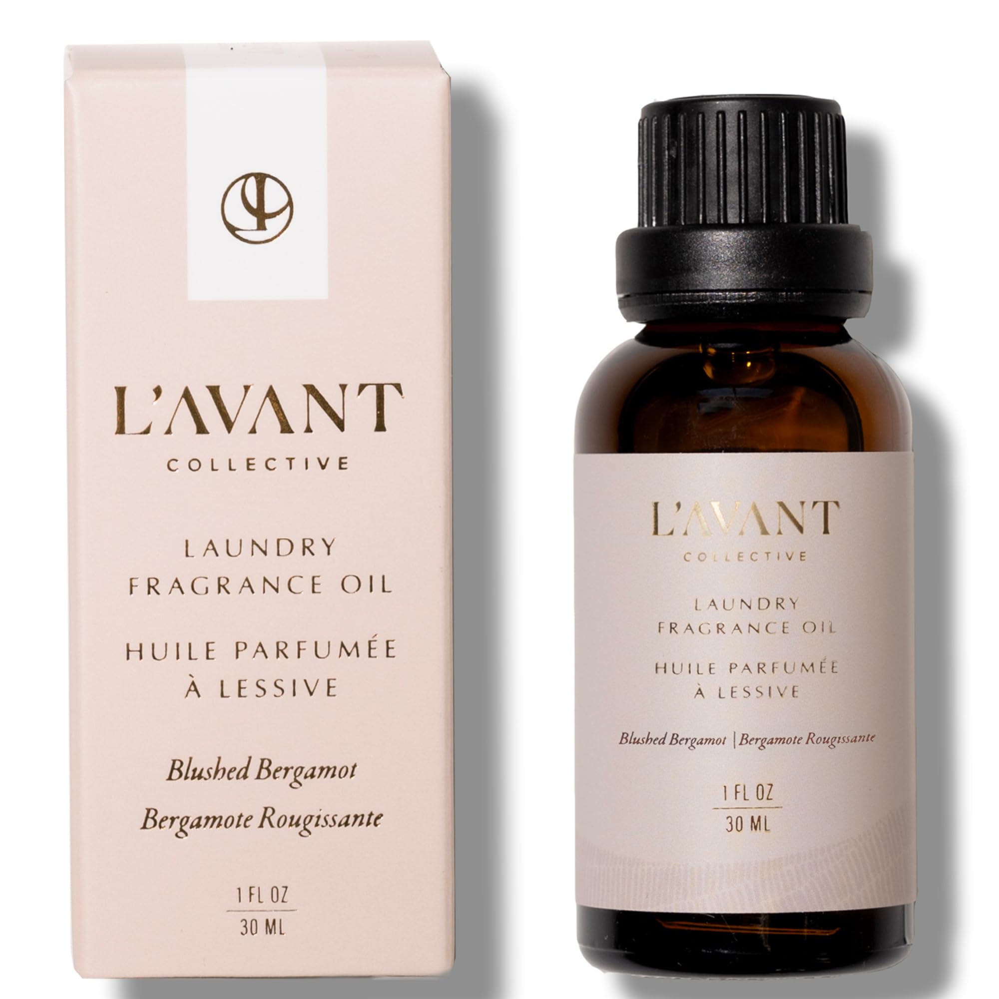 L'AVANT Collective blushed bergamot dryer balls releasing a fresh scent.