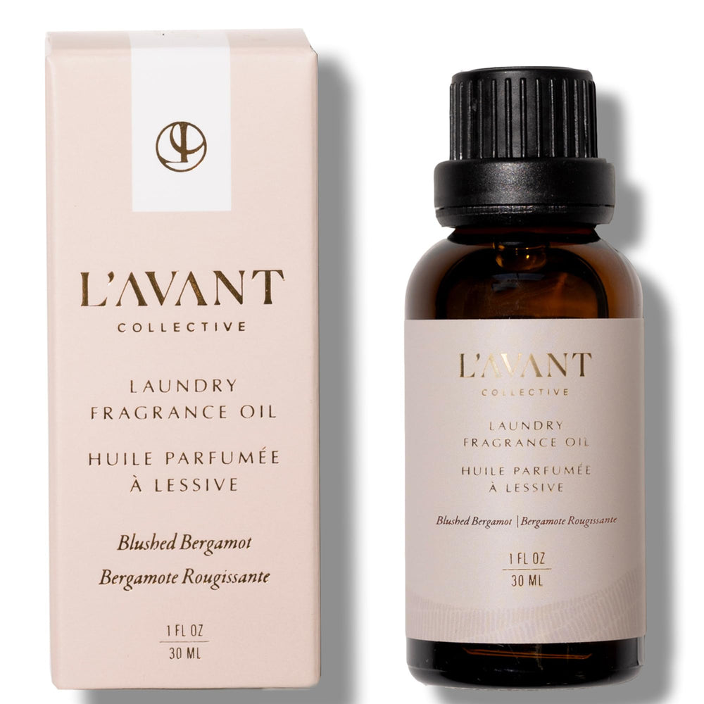 L'AVANT Collective blushed bergamot dryer balls releasing a fresh scent.