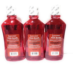 Lavoris Original Cinnamon mouthwash being poured, ideal after meals for quick fresh breath.
