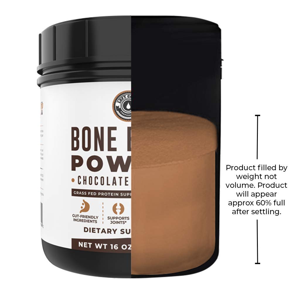 Pouring dairy-free chocolate bone broth powder into liquid for a smooth shake.