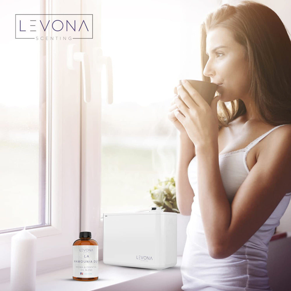 LEVONA SCENT Living room ambiance with diffuser fills space with fresh, balanced scent.