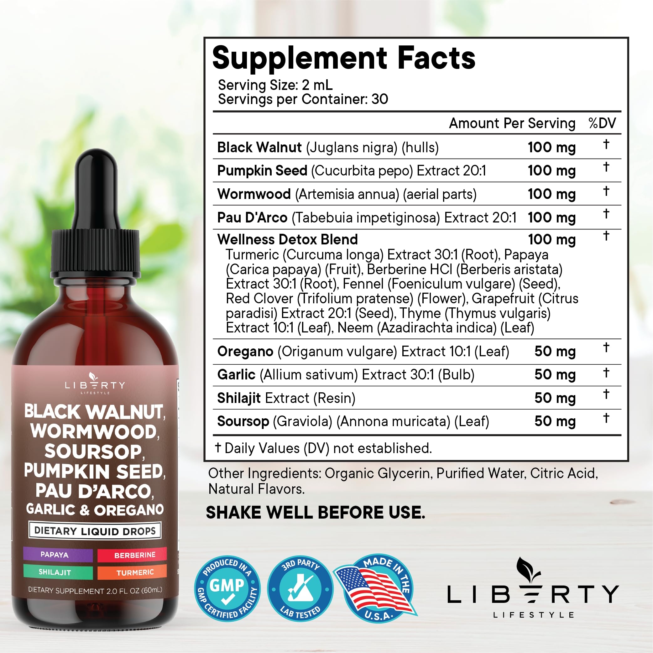 Liberty Lifestyle Defend wormwood bottle close-up showing liquid tincture for gut health.