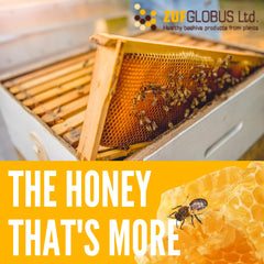 LIFEMEL honey with visible herbs close-up showcases botanical ingredients.