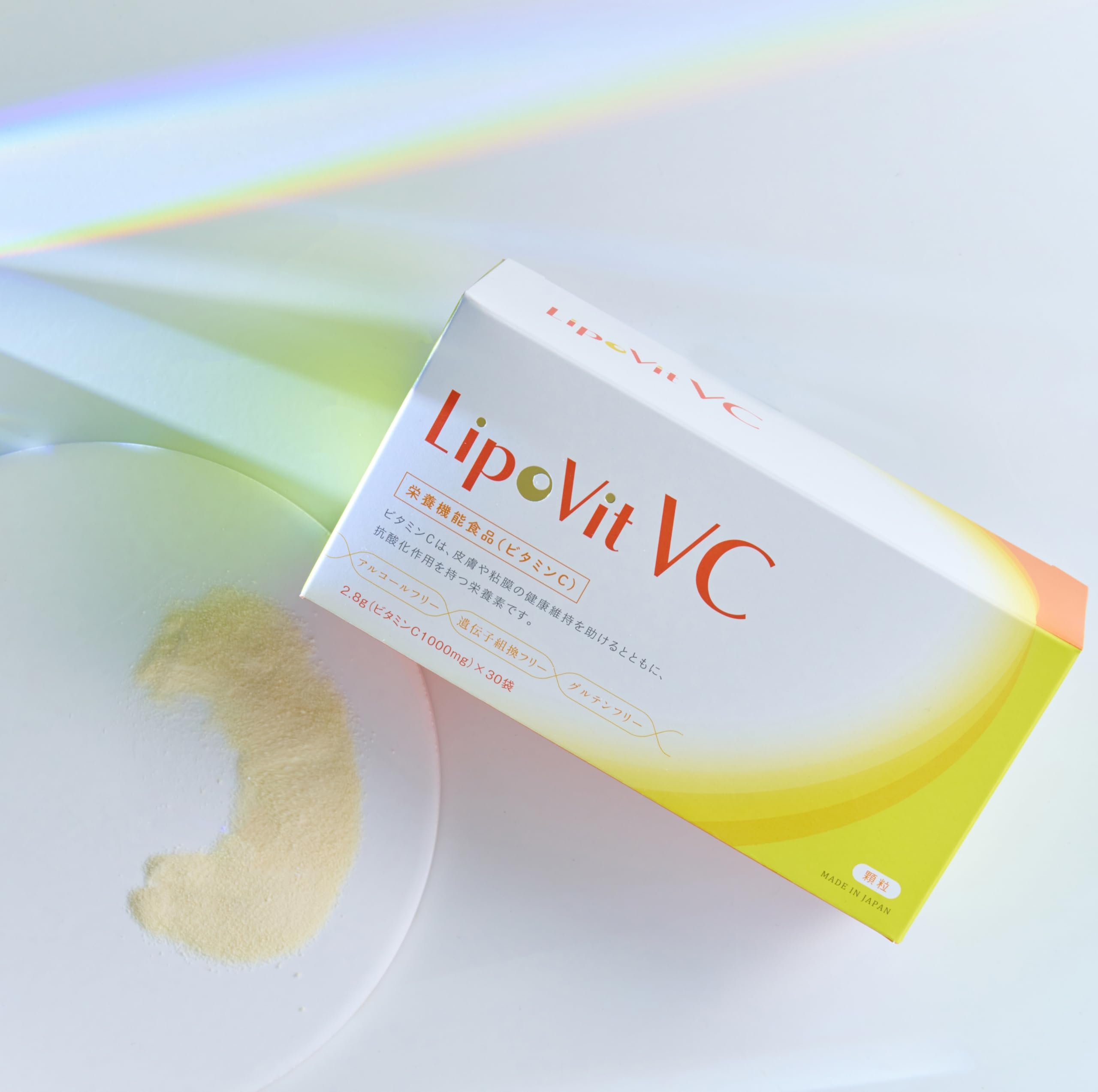 Hero shot of LipoVit VC packaging and sachets on a clean surface
