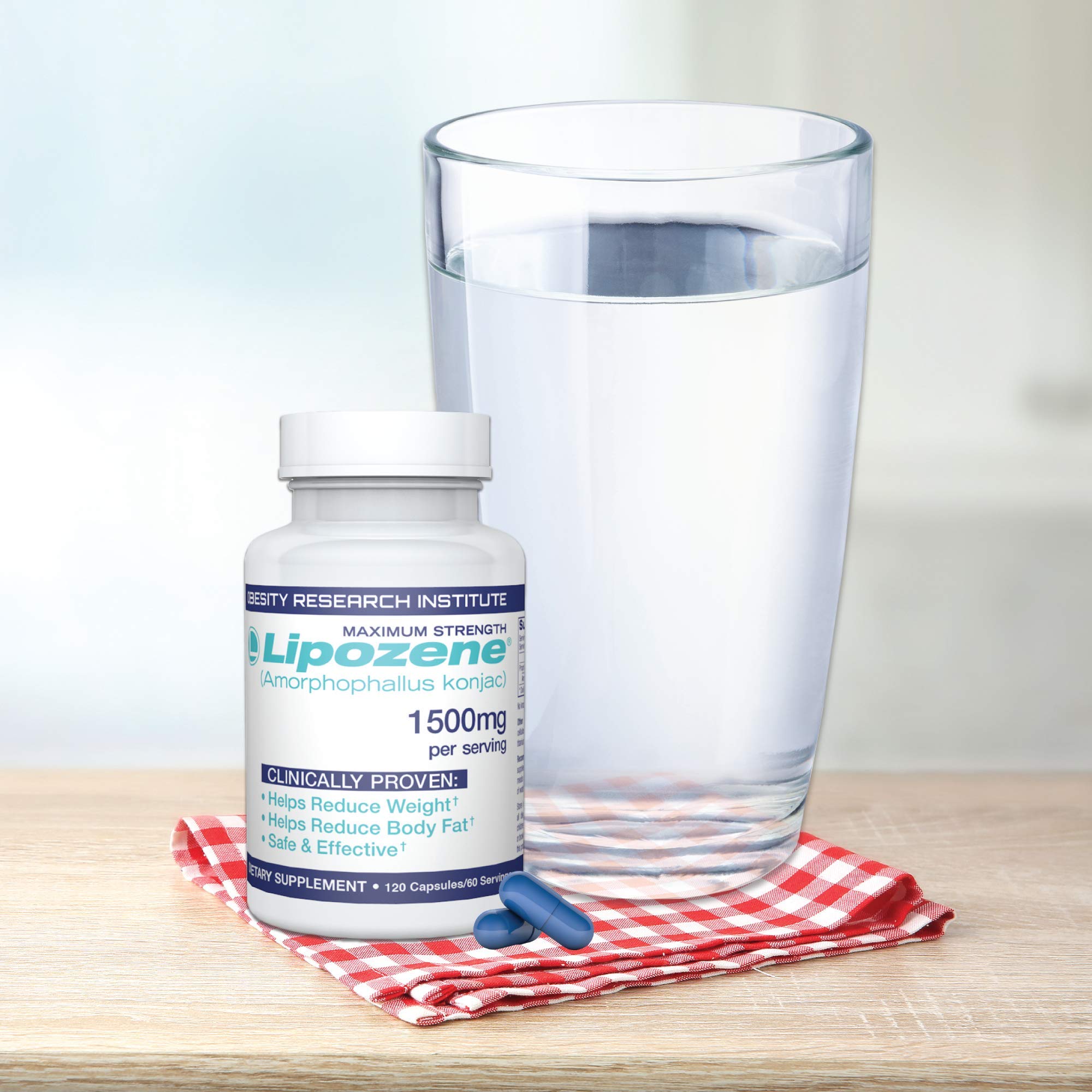 Lipozene measuring scoop beside bottle for simple daily use.