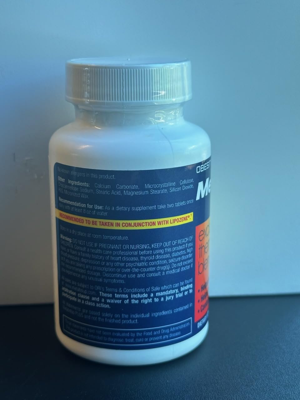 Lipozene MetaboUP Plus bottle storage suggests keep handy for energy needs.