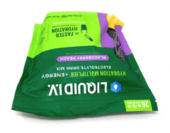 Liquid I.V. Hydration Multiplier energy at gym with bottle and towel.