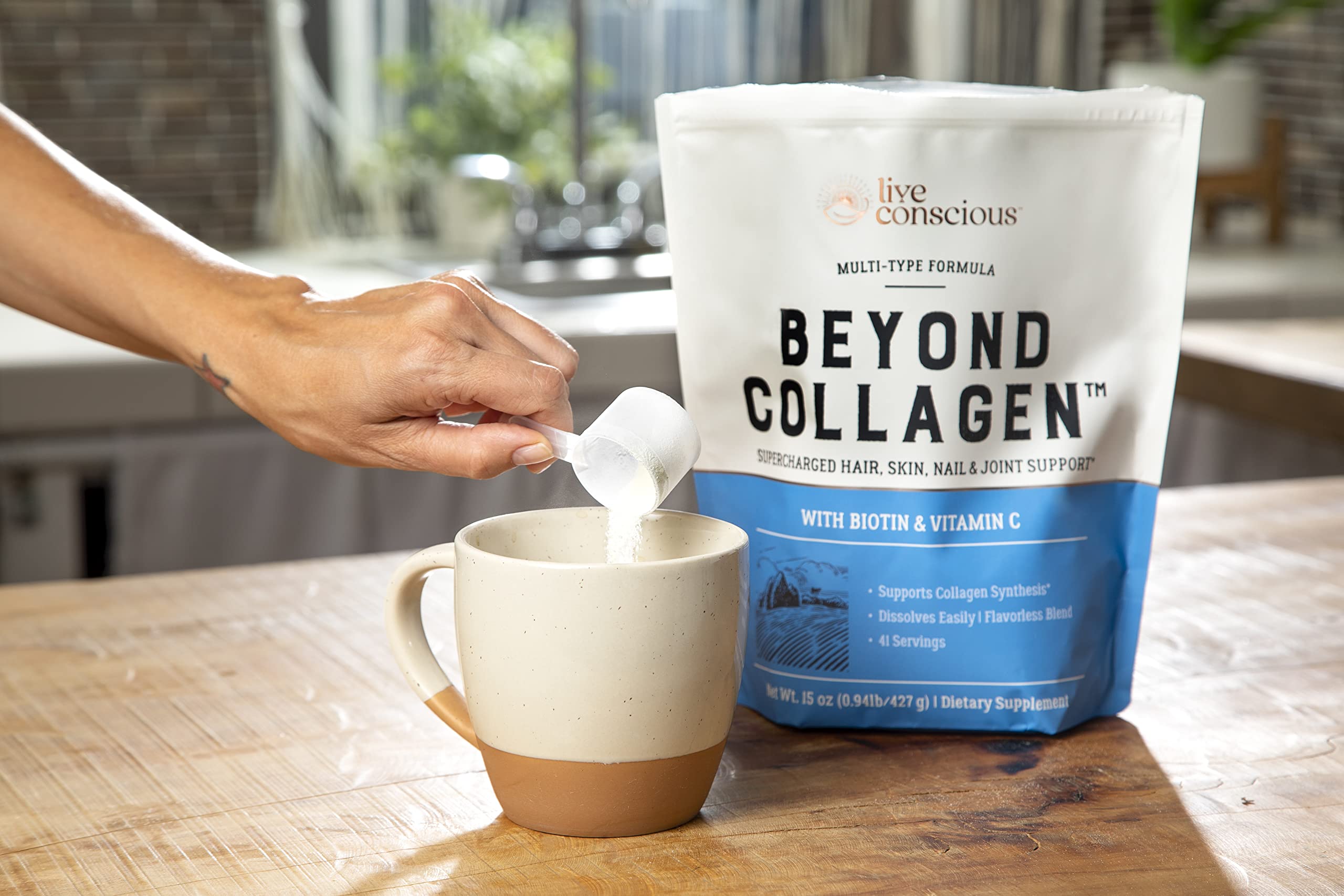 Live Conscious Beyond Collagen poured into a glass with visible steam to suggest freshness