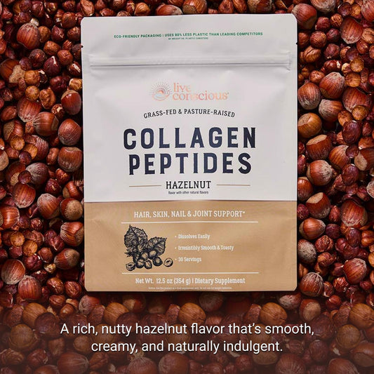 Live Conscious Collagen Hazelnut powder scoop beside bottle for easy daily servings.