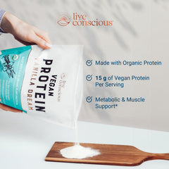 Live Conscious Vanilla Dream vegan protein scoop in glass shows creamy texture