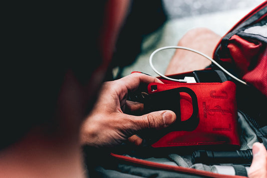 Live The Creed EDC kit contents displayed, including micro first aid kit and gloves for everyday readiness