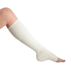 Lohmann & Rauscher TG Shape tubular bandage below the knee provides stable leg coverage for edema-prone calves.