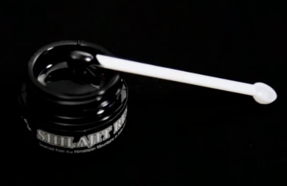 Lost Empire Herbs Shilajit Resin scoop demonstrates easy daily dosing for vigor.