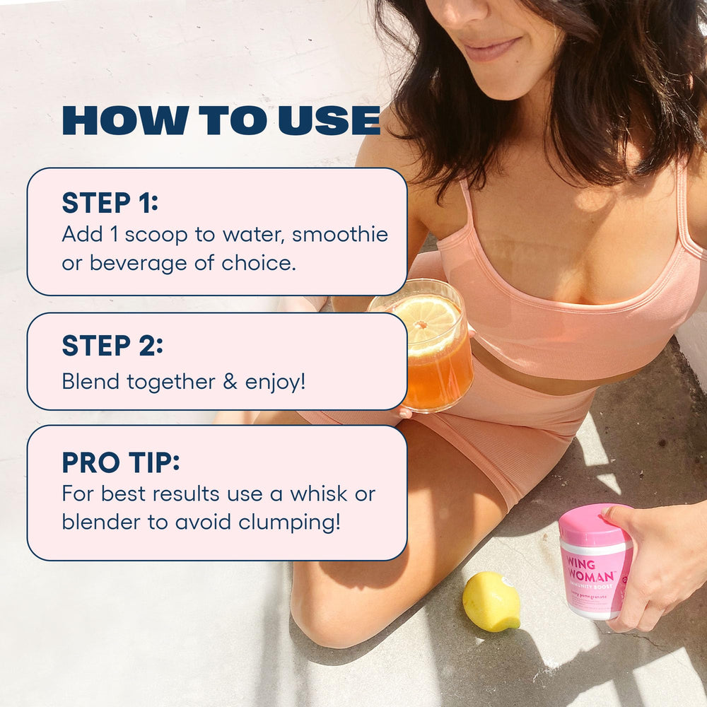 Love Sweat Fitness Immunity Boost Powder mixed in water in a glass, refreshing berry flavor.