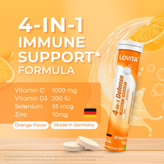 Lovita 4-in-1 Defense dissolving tablet in water with orange fizz.
