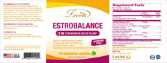 Lifestyle image of a woman taking Lovita Estrobalance capsule at home