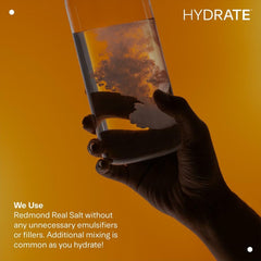 LTH Hydrate beverage in glass after mixing Peach Mango flavor