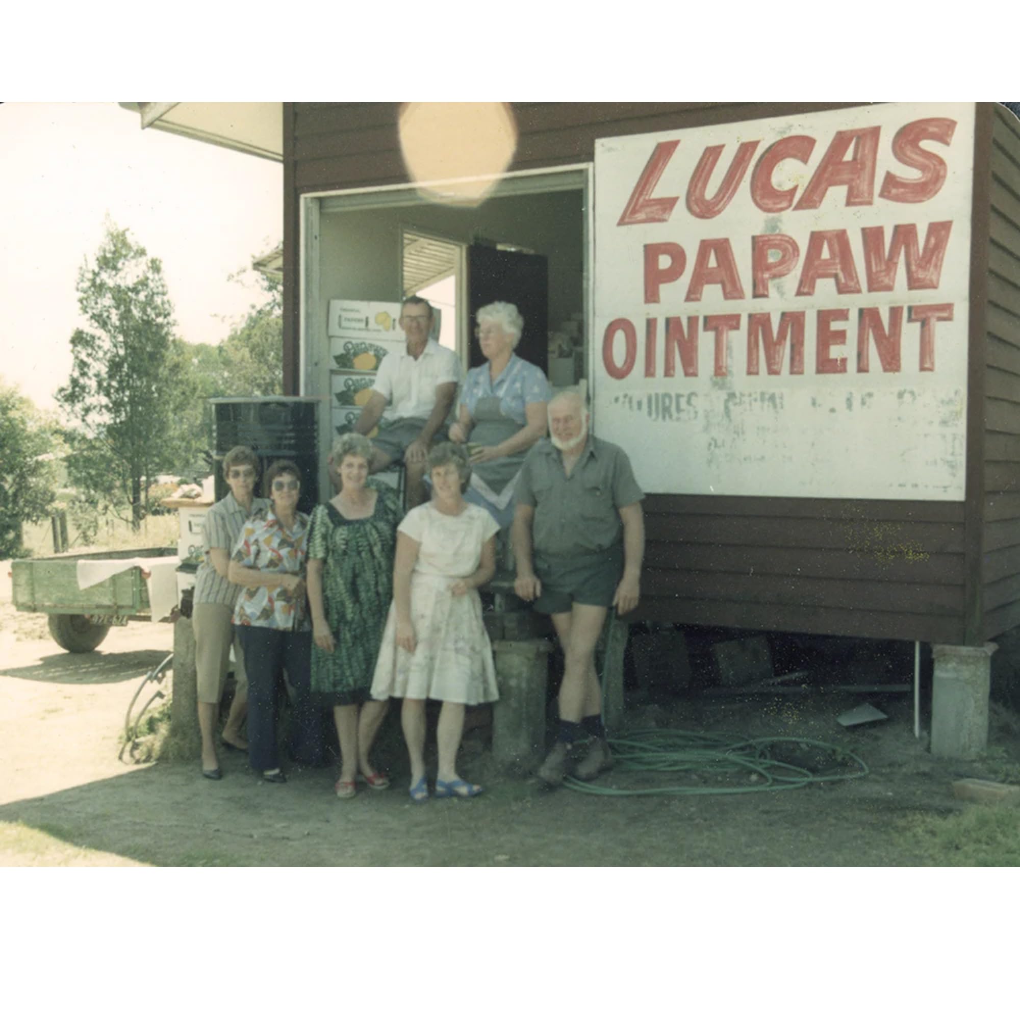 Lucas Papaw Ointment tub open, creamy texture for gentle skin nourishment.