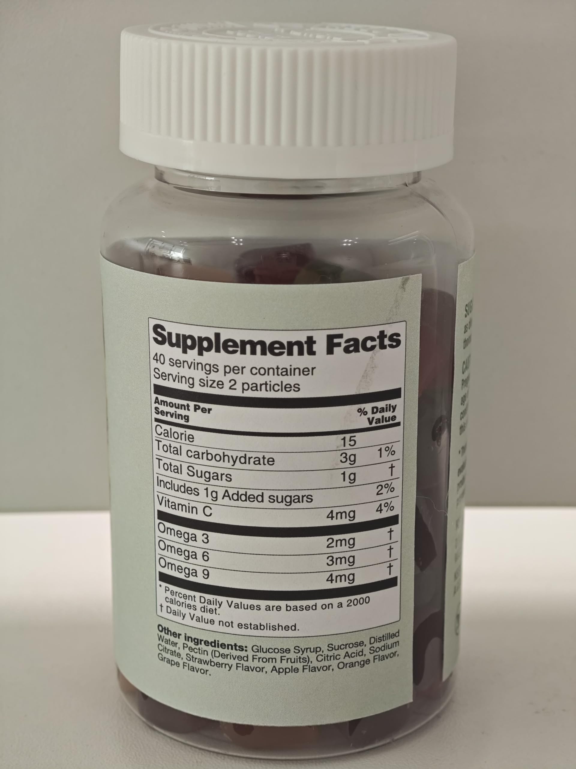 Close-up texture shows smooth, natural flavors in LUCKCHAN Omega Gummies