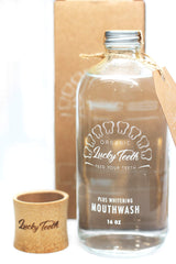 Lucky Teeth Organic Mouthwash whitening bottle for refreshed breath.