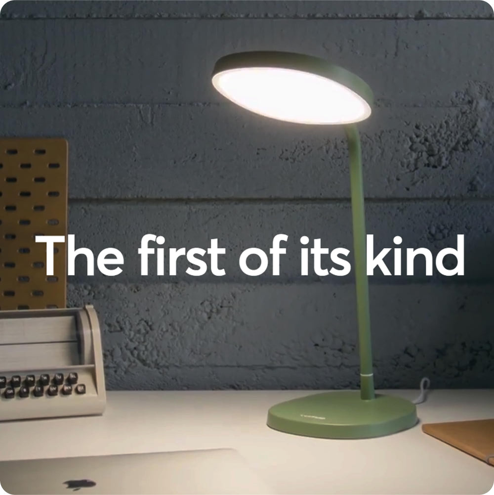 Lumie Task sage green finish adds calm to your workspace.