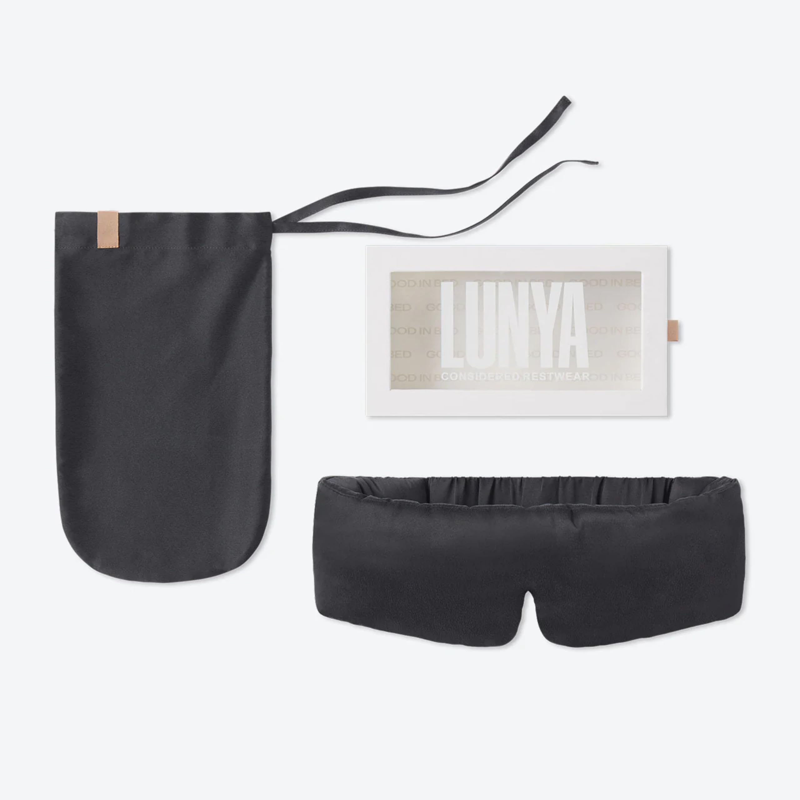 Lunya sleep mask close-up fabric texture, breathable silk for comfort.